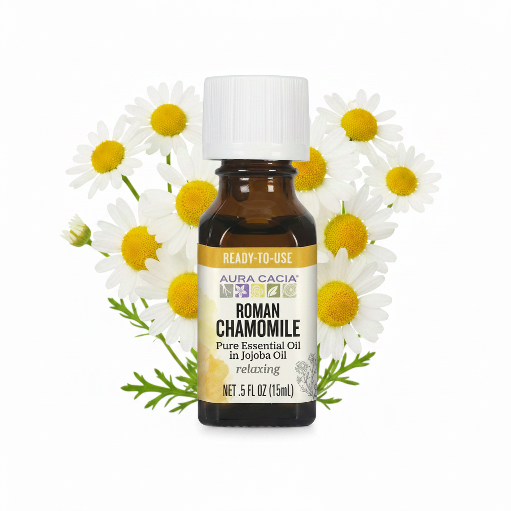Aura Cacia Roman Chamomile in Jojoba Oil with chamomile flowers behind bottle