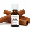 Aura Cacia Cassia essential oil bottle on white background