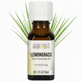 Aura Cacia Lemongrass essential oil with lemongrass in the backgrond