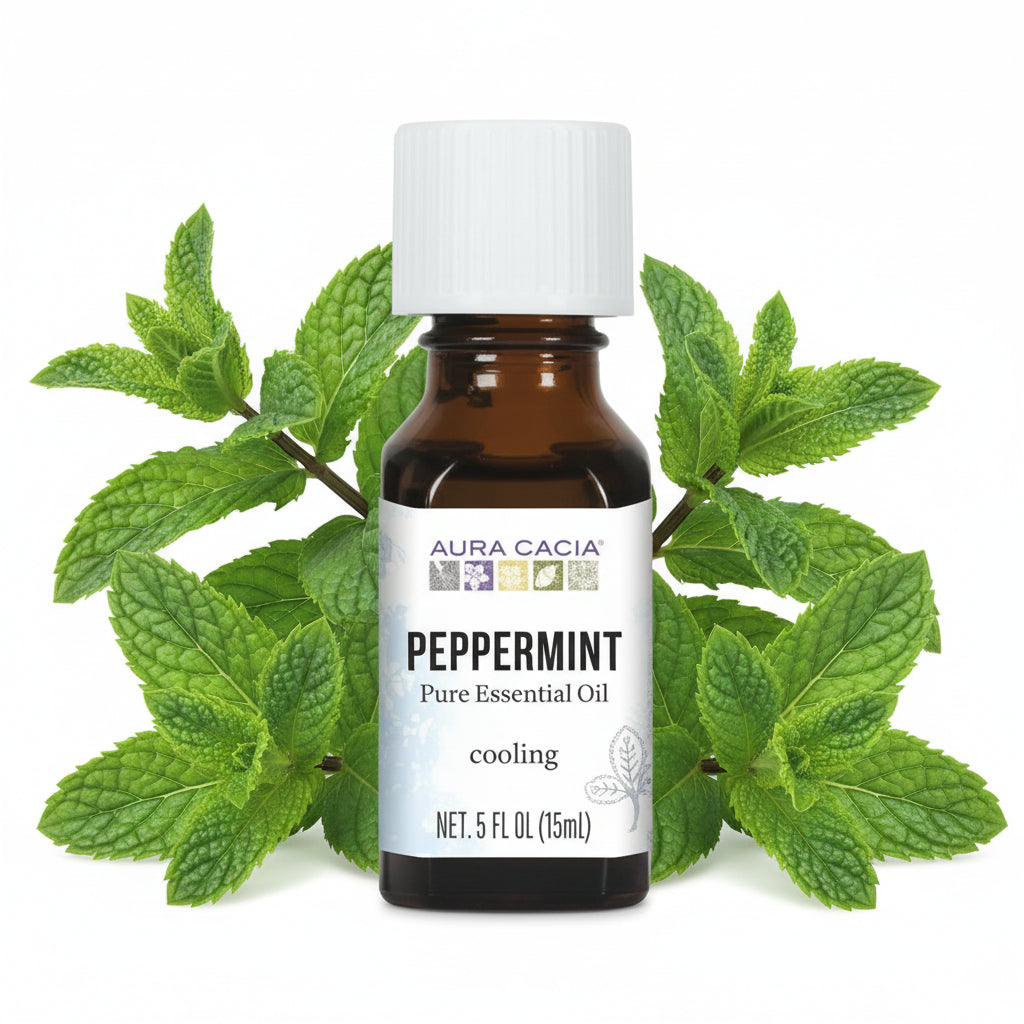 Aura Cacia peppermint essential oil bottle on white background
