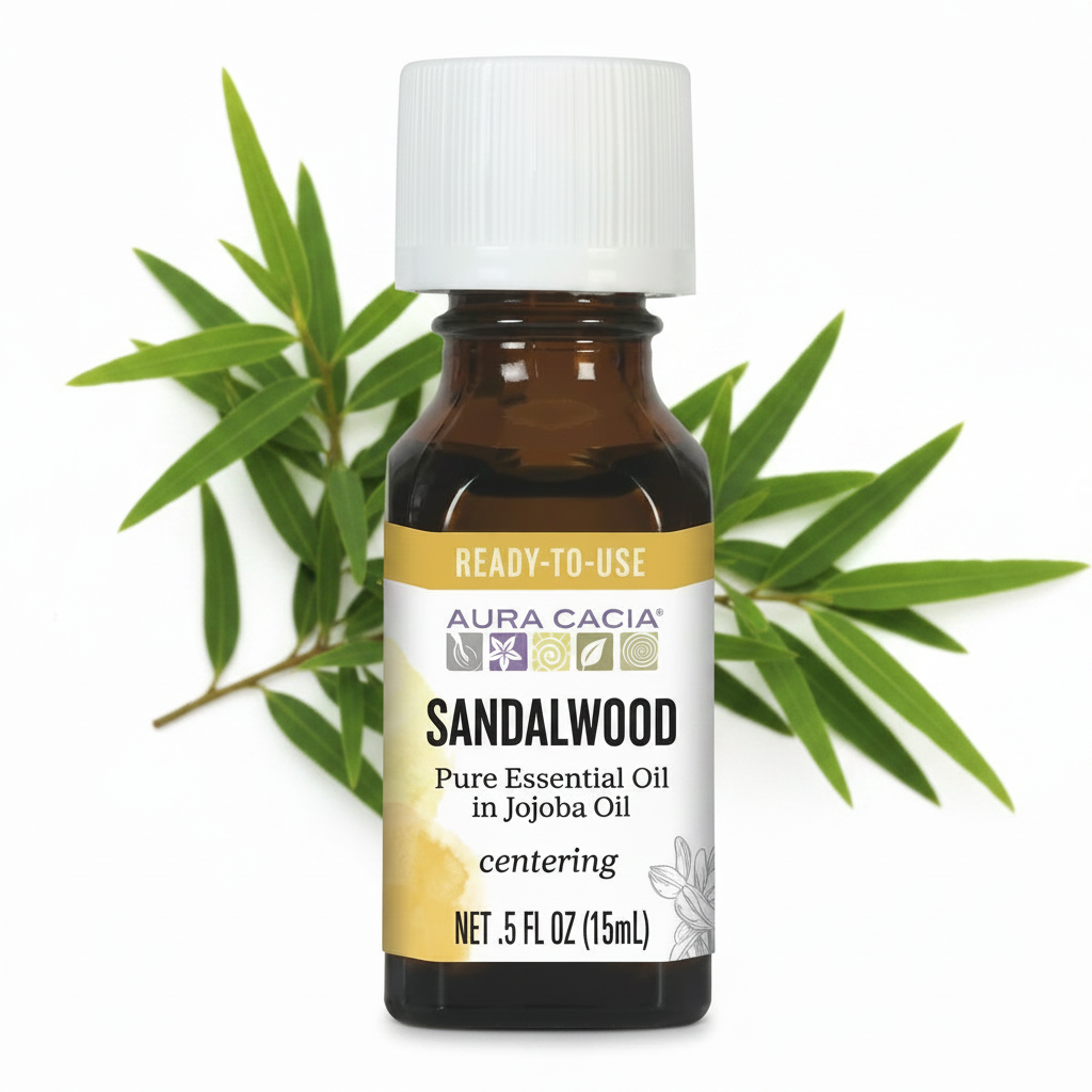 Aura Cacia Sandalwood Essential Oil in Jojoba Oil with sandalwood behind bottle