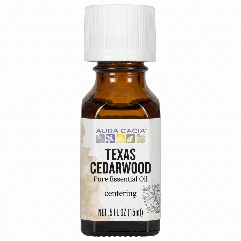 Aura Cacia Texas Cedarwood essential oil on white background