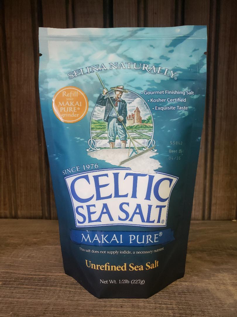 Bag of Celtic Sea Salt Makai Pure on a wooden surface