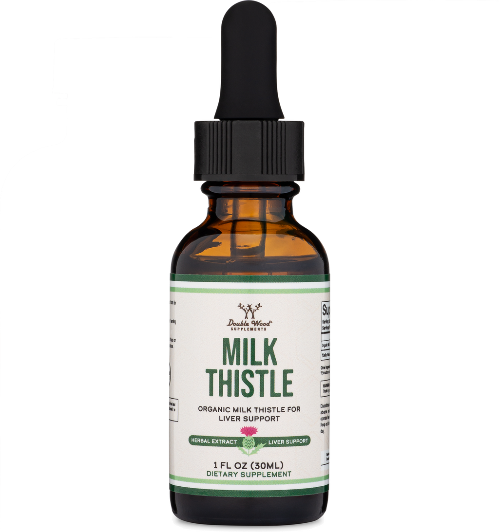 Milk thistle dietary supplement bottle with dropper on a white background