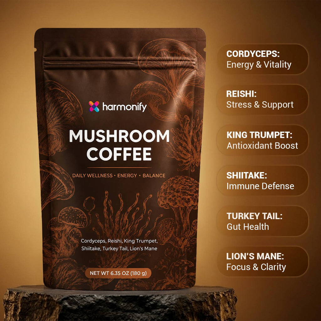 A stand-up pouch of harmonify Mushroom Coffee placed on a dark wooden surface against a warm brown gradient background. The package is dark brown with illustrated mushroom graphics and white text.