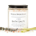 Jar of Mamas Medicinals CBD bath salts on white backgrond with lavender and lemongrass at the base