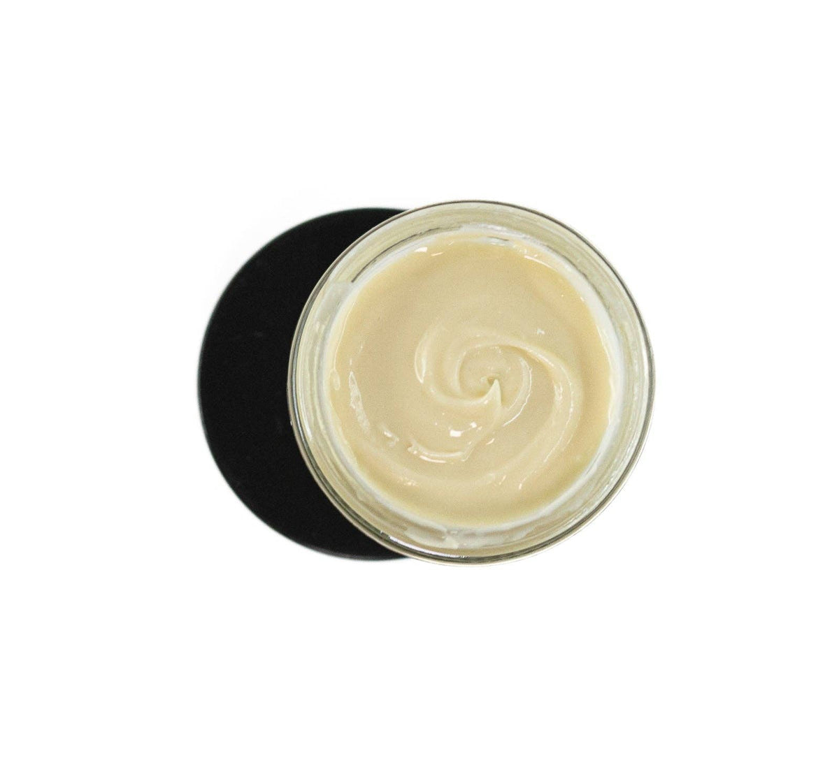 Jar of cream with a black lid on a white background