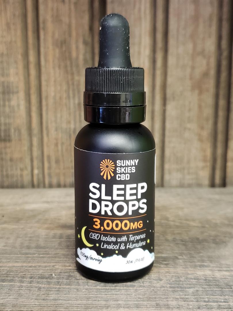 Sunny Skies Isolate Sleep Drops on wooden surface