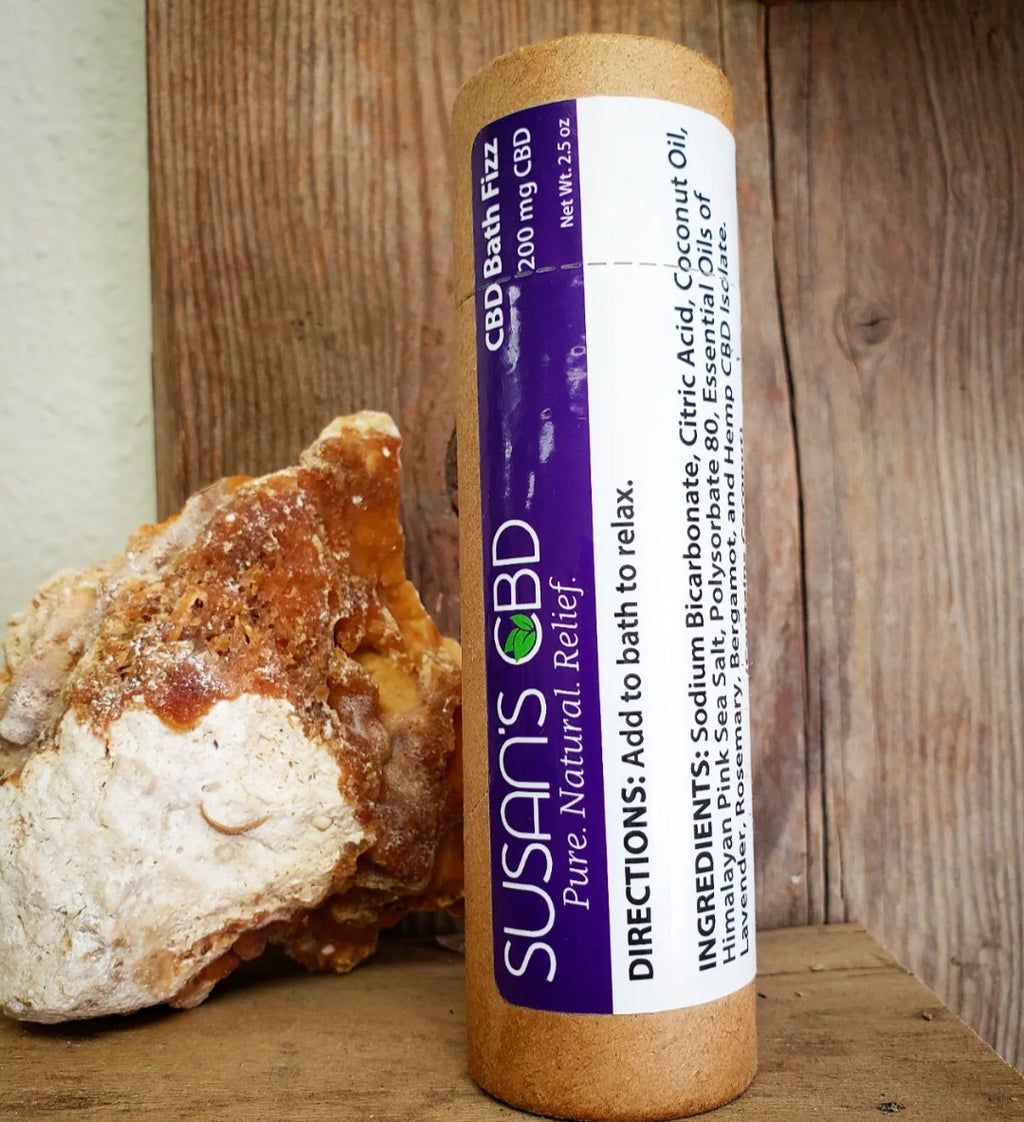 Susan's CBD bath fizz on rustic background