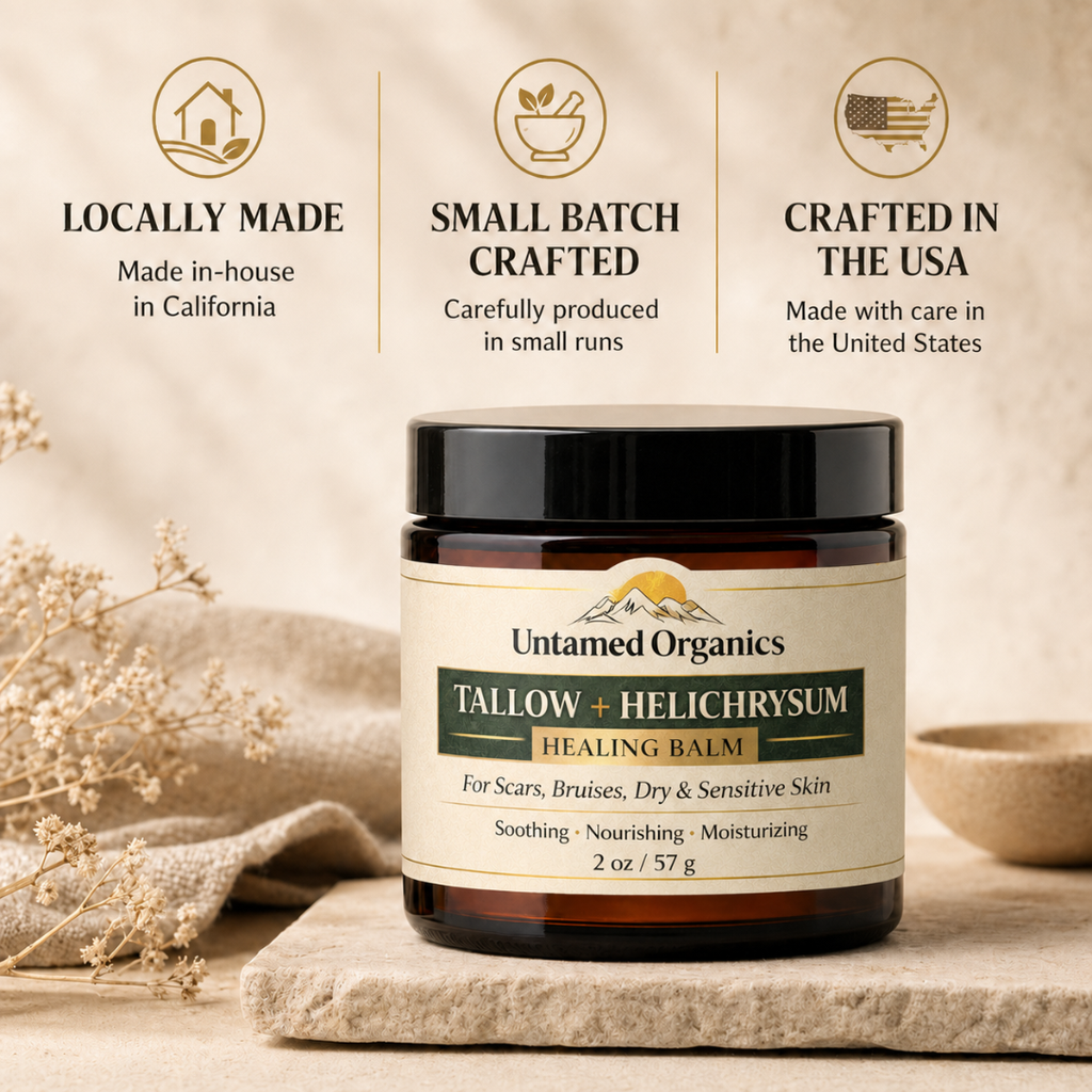 Jar of Untamed Organics Tallow + Helichrysum Healing Balm with branding and product details on a neutral background.